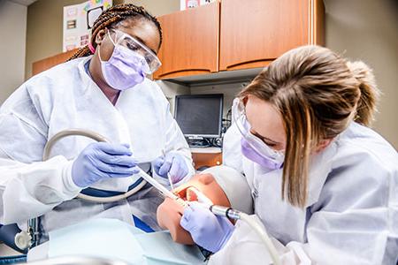 Students Practice their Dental Assisting Skills at Remington College